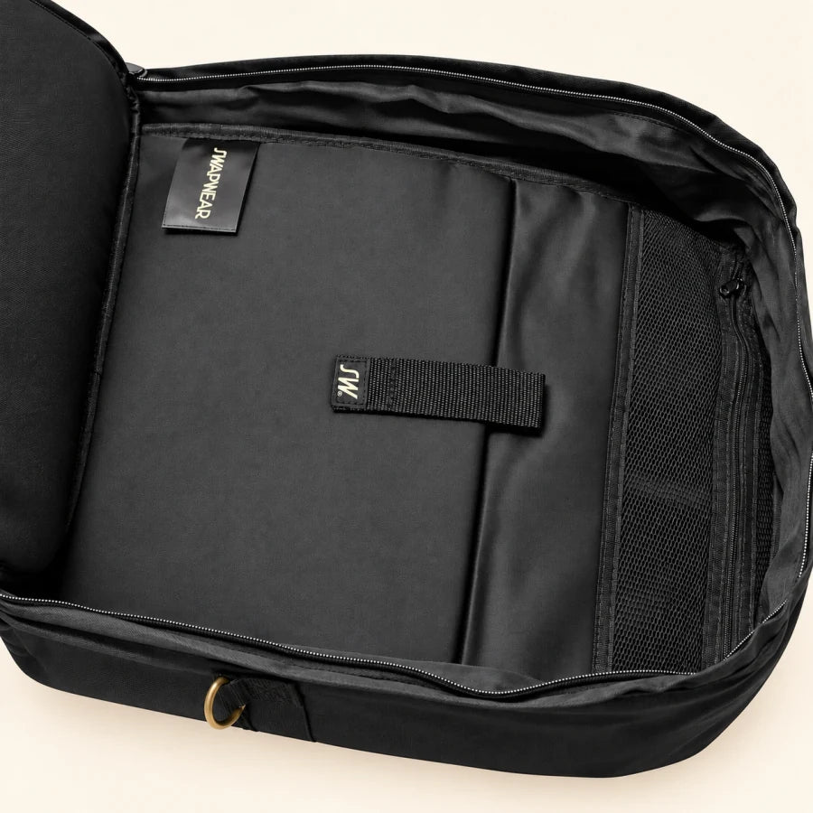 Jet Backpack: open interior with padded laptop sleeve and mesh pockets