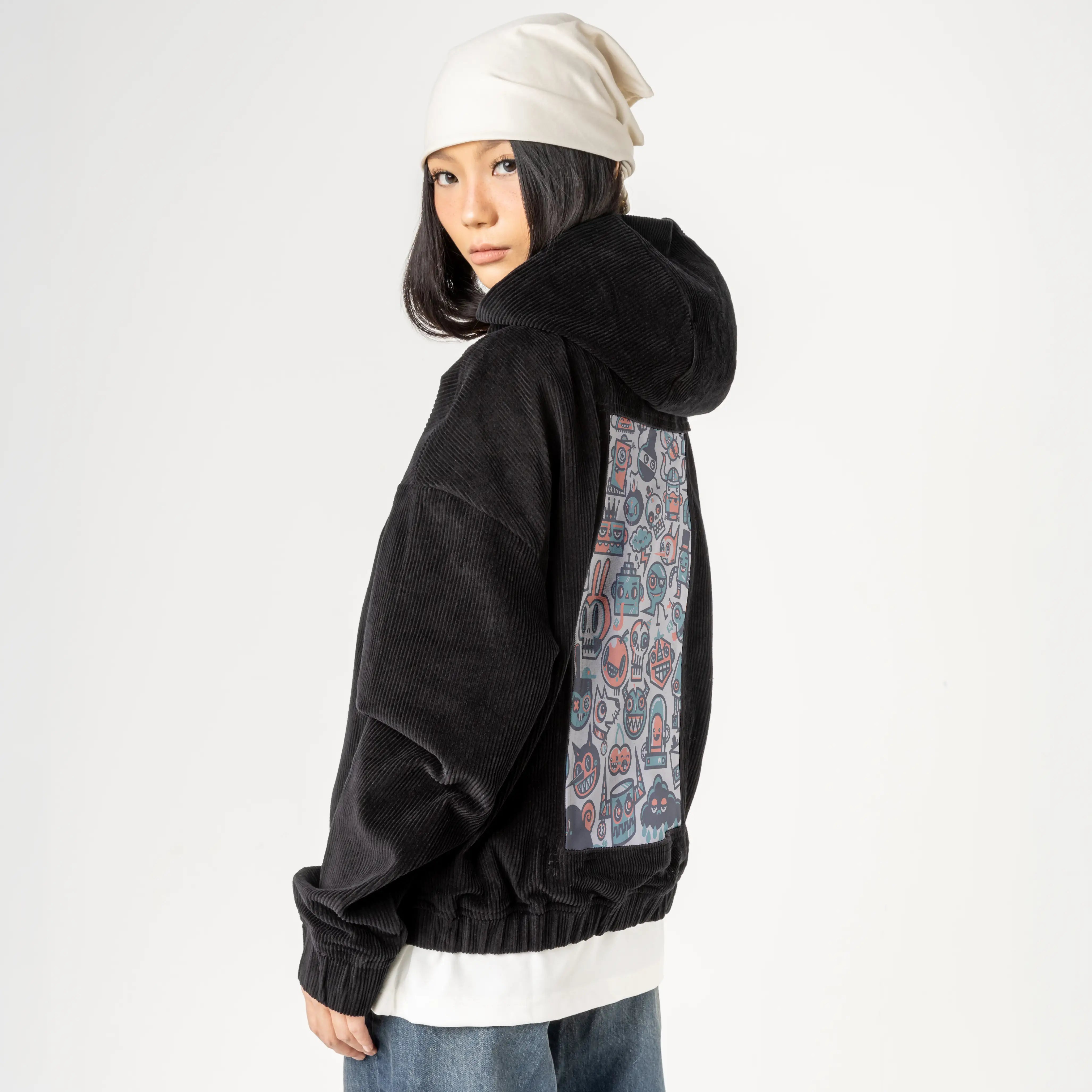 61cartoons patch on female retro cord hoodie in onyx