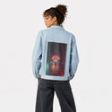 absolution patch on female og denim jacket in oceanside