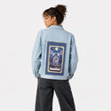 aceofwands patch on female og denim jacket in oceanside