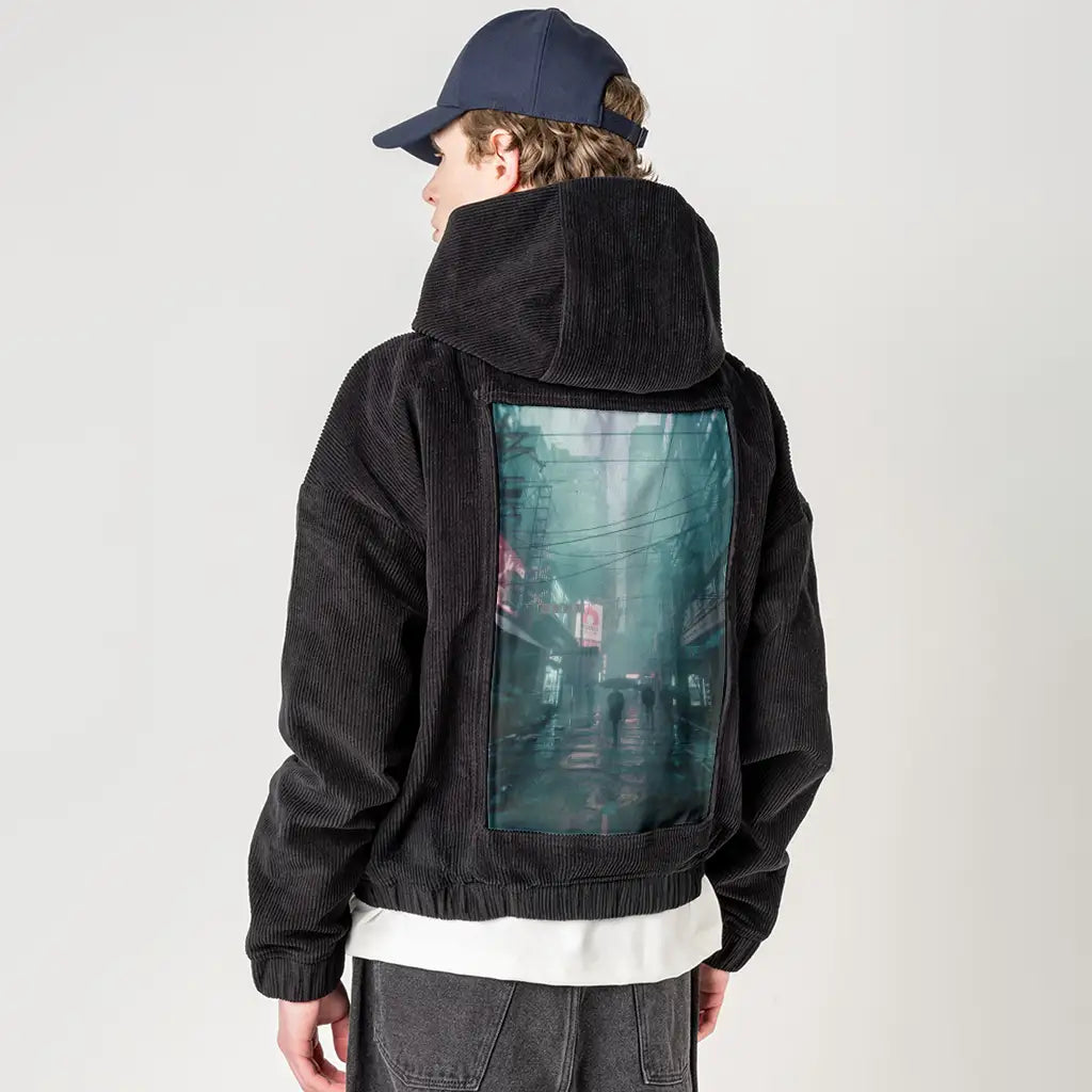 acidrain patch on male retro cord hoodie in onyx