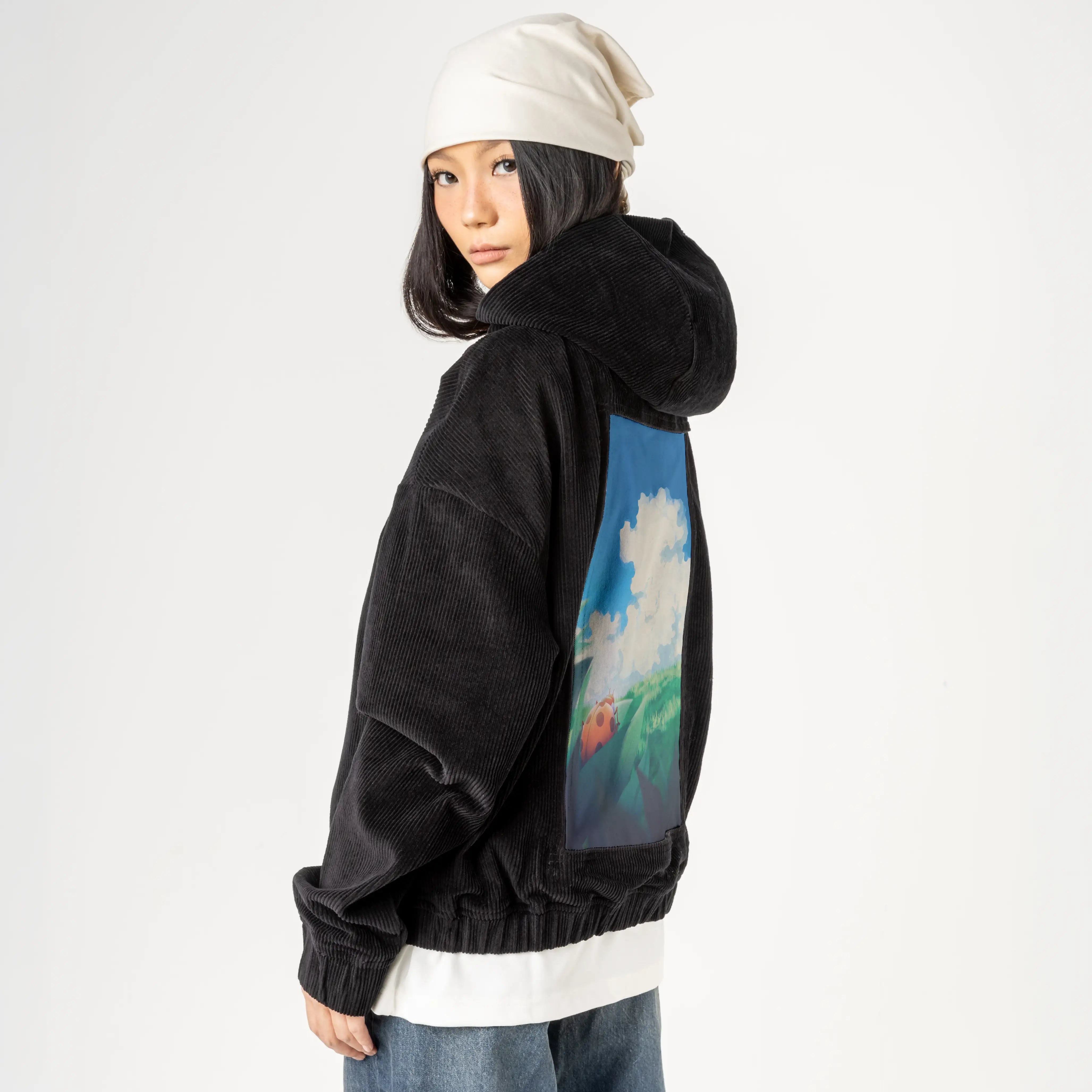 afternoon patch on female retro cord hoodie in onyx
