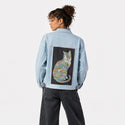 aquacat patch on female og denim jacket in oceanside
