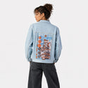 armor patch on female og denim jacket in oceanside