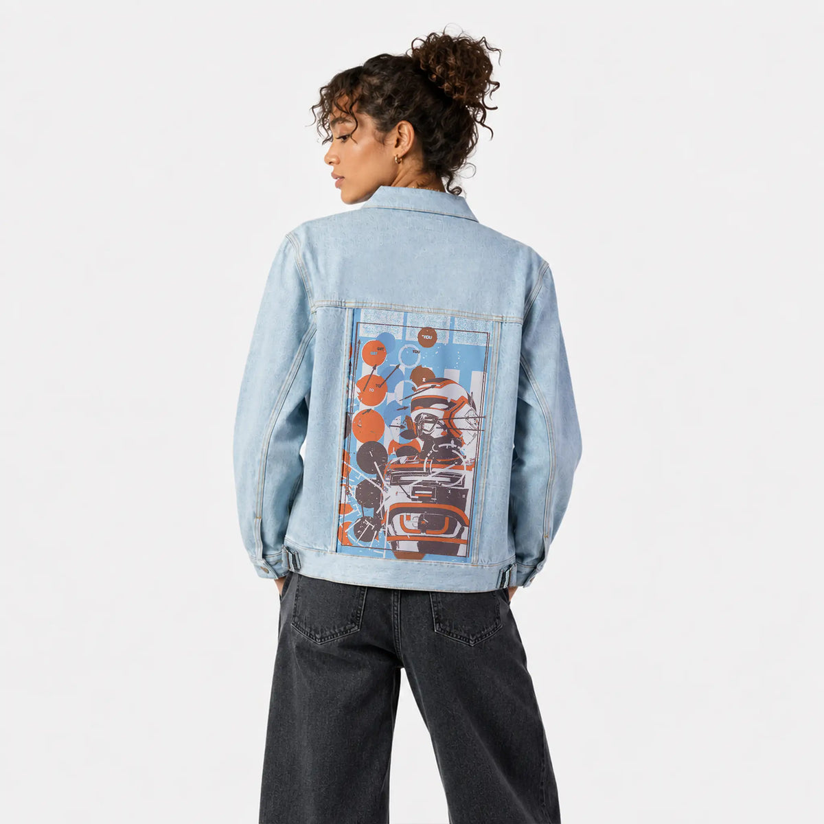 armor patch on female og denim jacket in oceanside