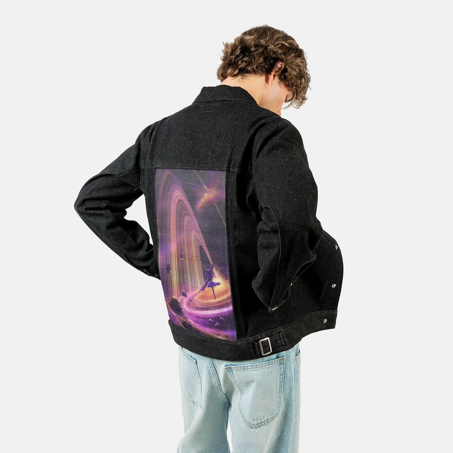 astra patch on male og denim jacket in raven