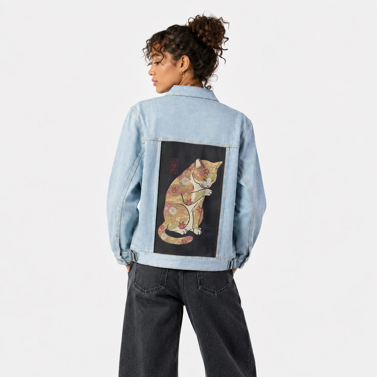 autumncat patch on female og denim jacket in oceanside