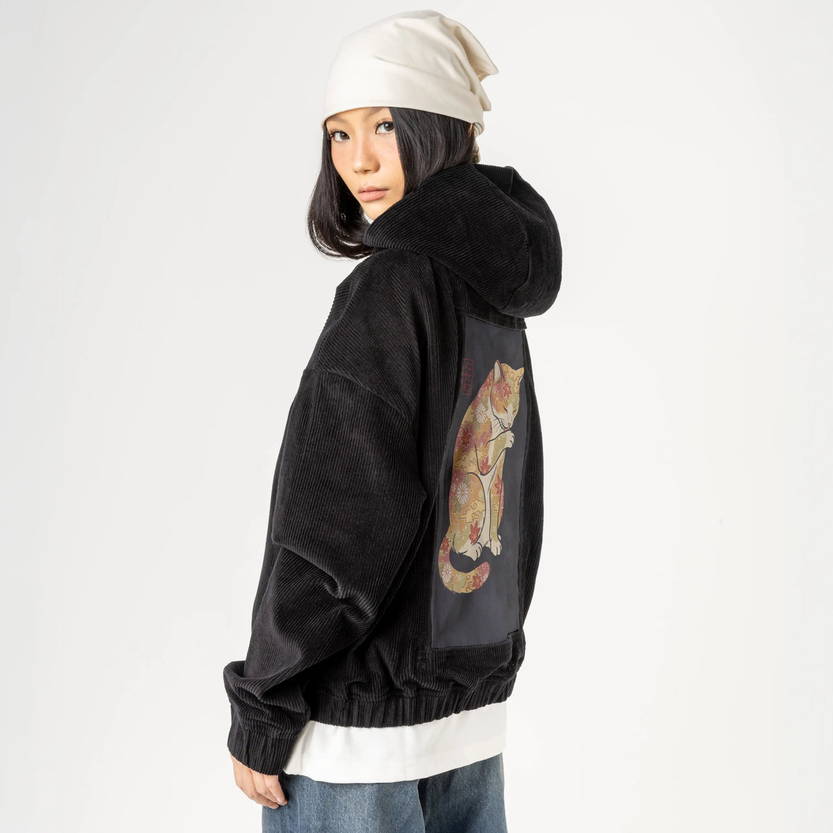 autumncat patch on female retro cord hoodie in onyx