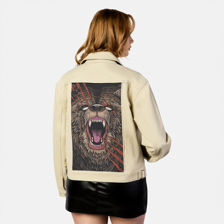 backscratcher patch on female atelier canvas jacket in tan