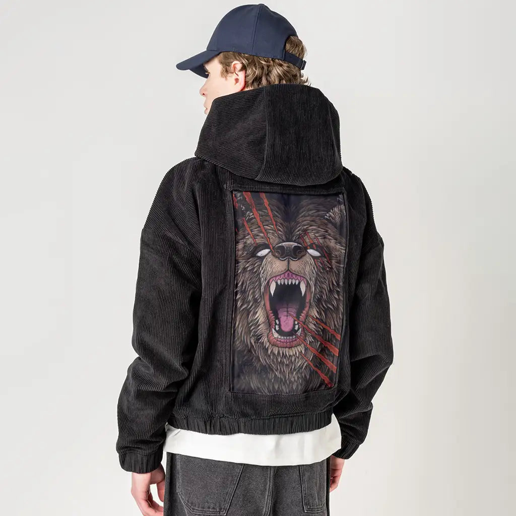 backscratcher patch on male retro cord hoodie in onyx
