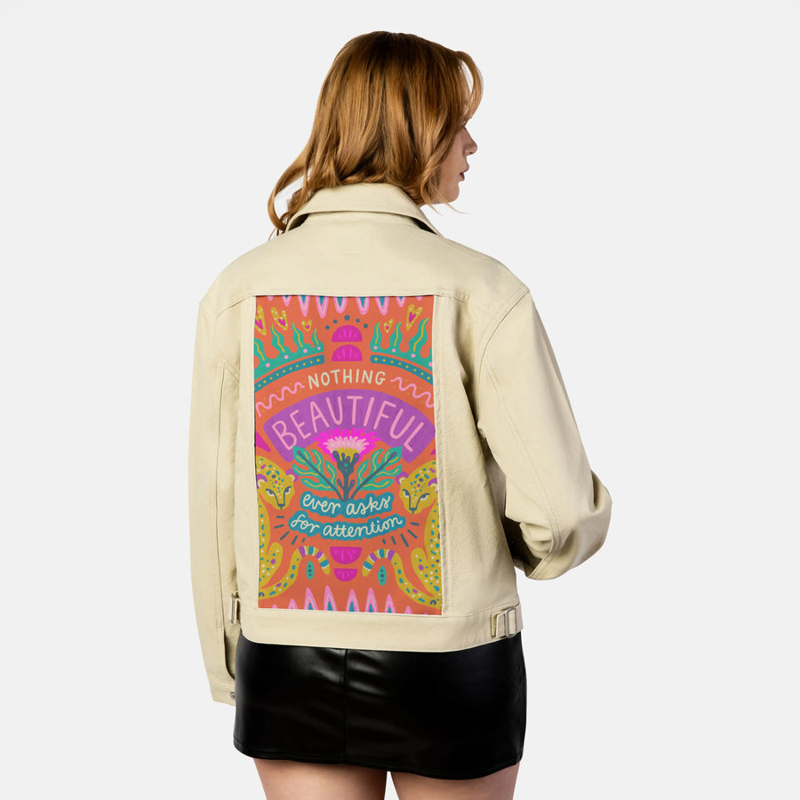 beautiful patch on female atelier canvas jacket in tan