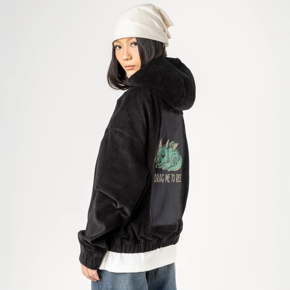 bedtime patch on female retro cord hoodie in onyx
