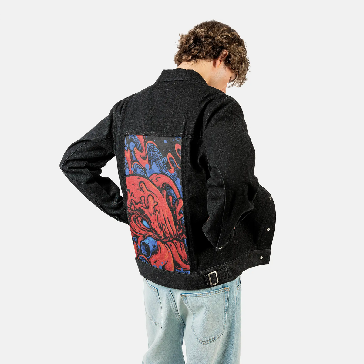 berrykraken patch on male og denim jacket in raven