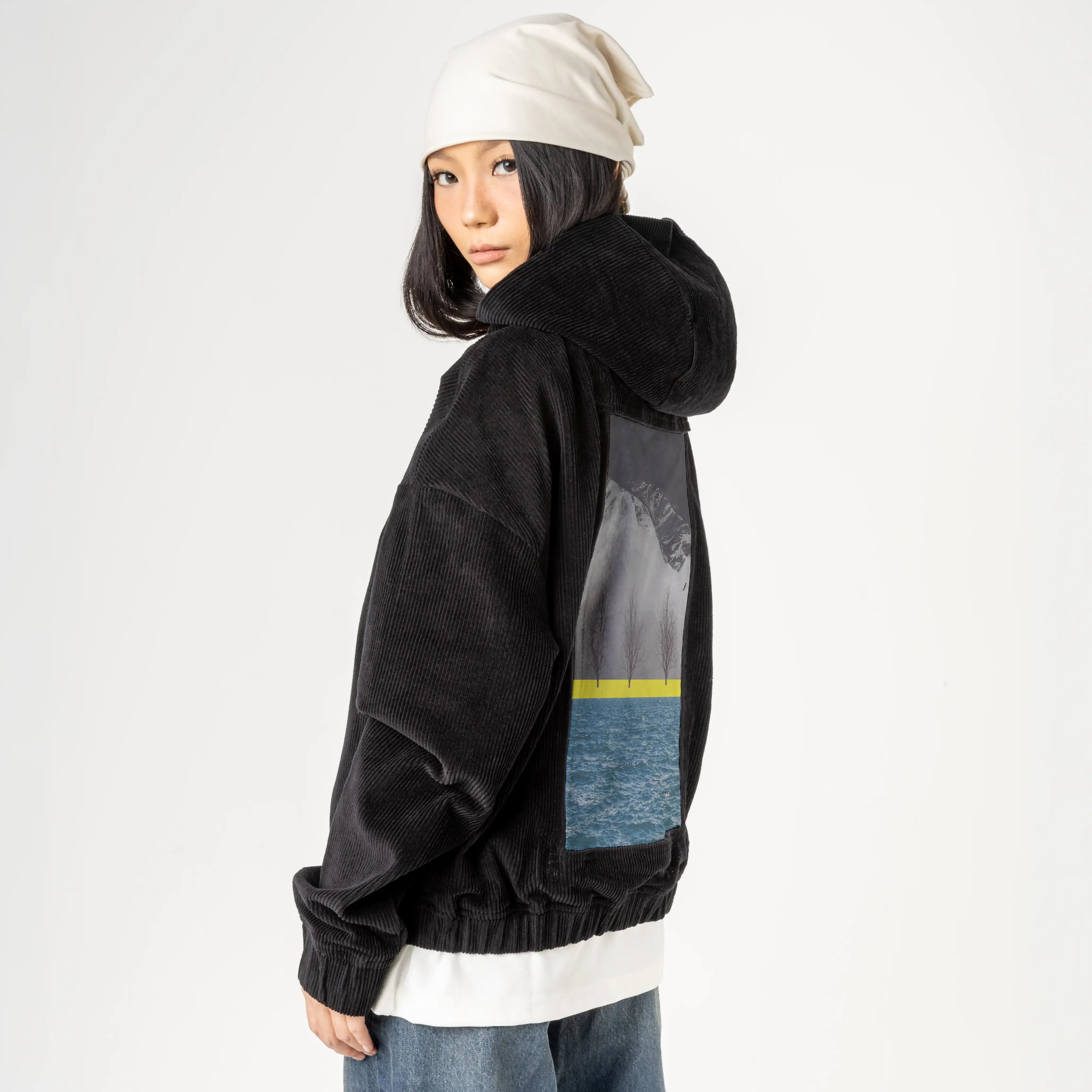 betweenmountainandsea patch on female retro cord hoodie in onyx