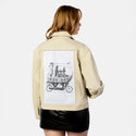 birdboat patch on female atelier canvas jacket in tan