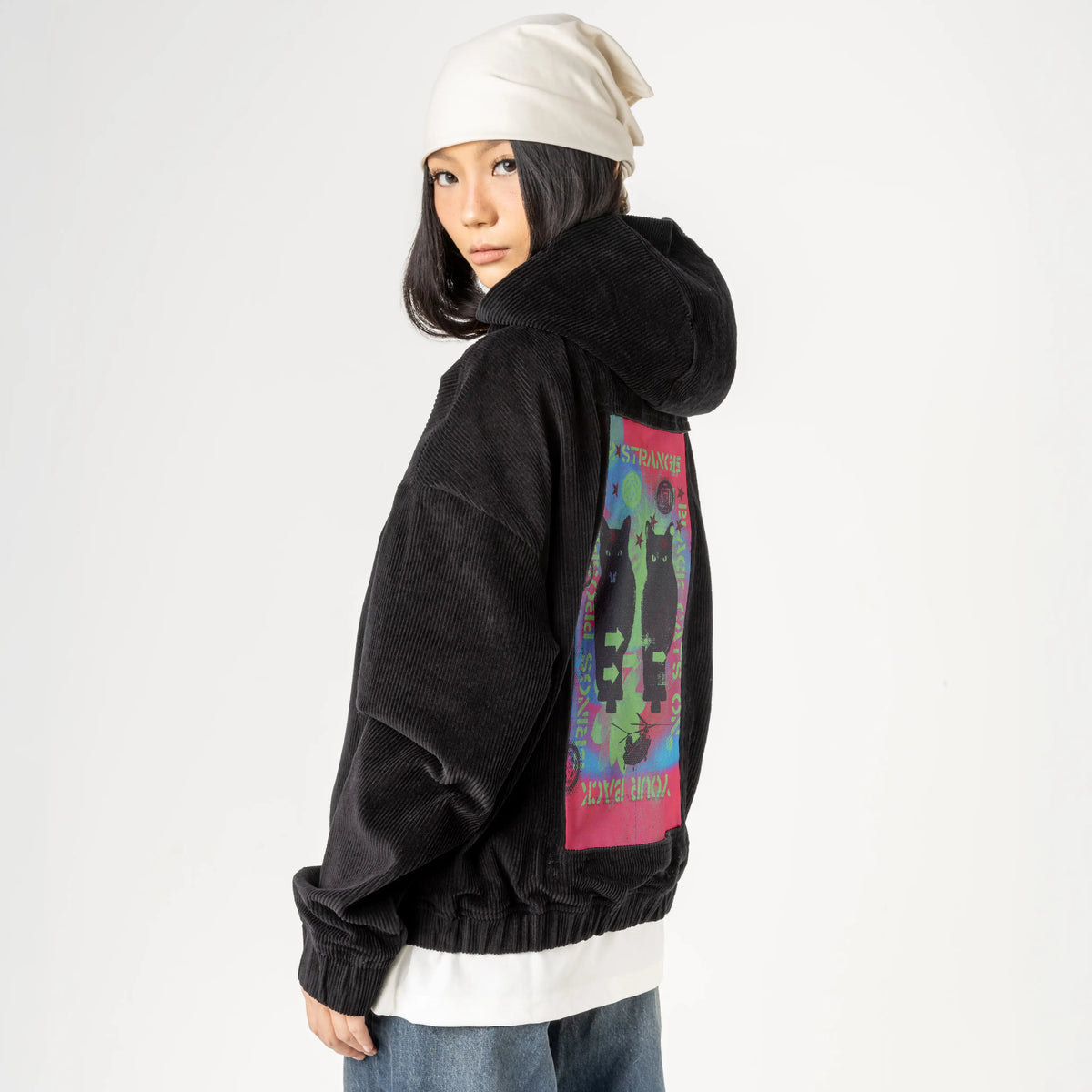 blackcats patch on female retro cord hoodie in onyx