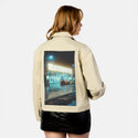 blockbuster patch on female atelier canvas jacket in tan