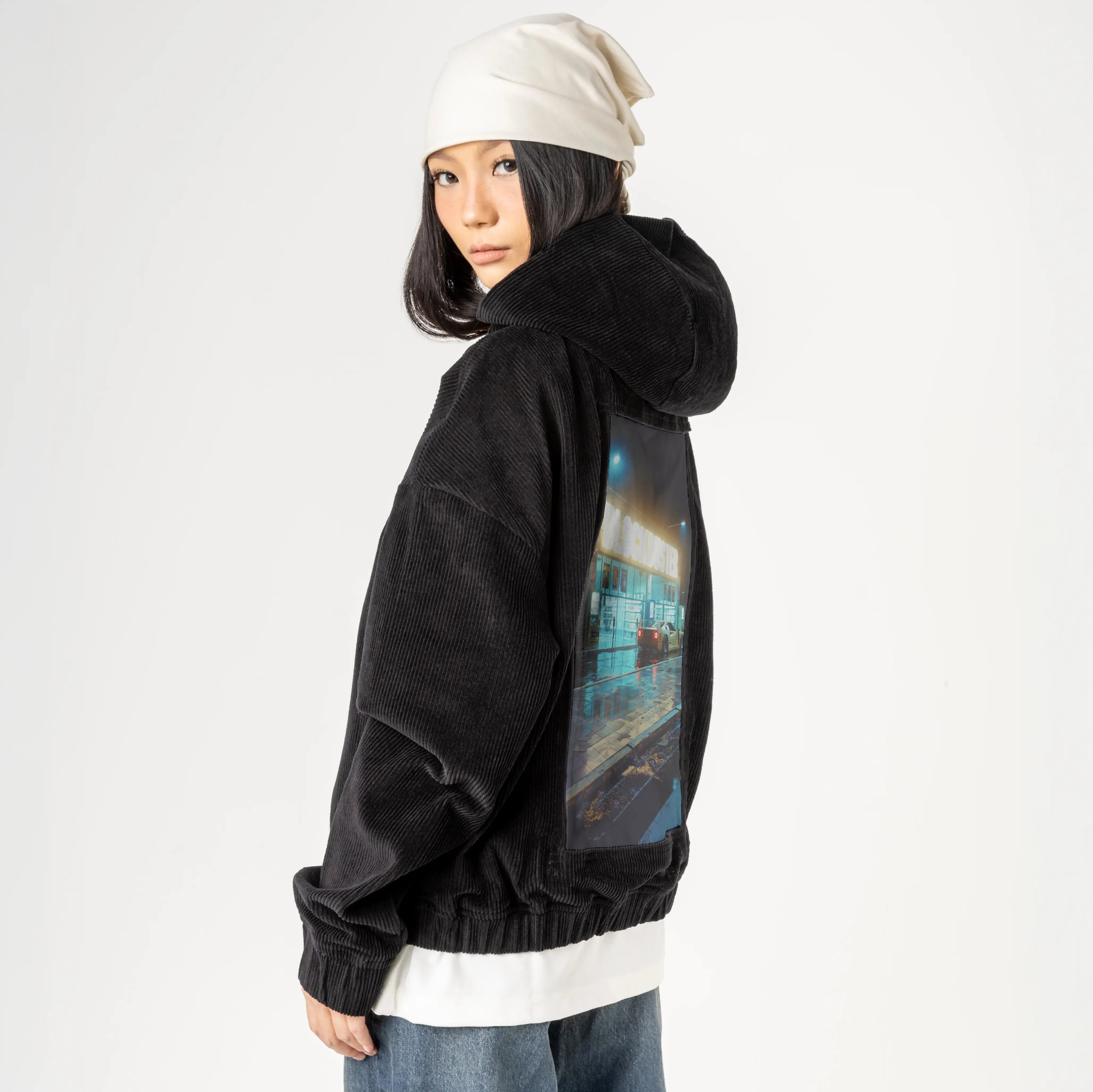 blockbuster patch on female retro cord hoodie in onyx