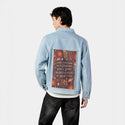 bloom patch on male og denim jacket in oceanside