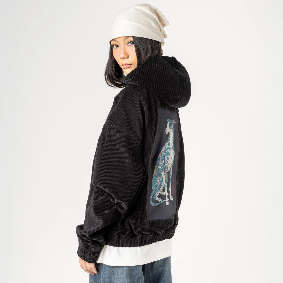 blossomhound patch on female retro cord hoodie in onyx