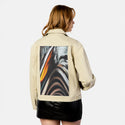 blurst patch on female atelier canvas jacket in tan