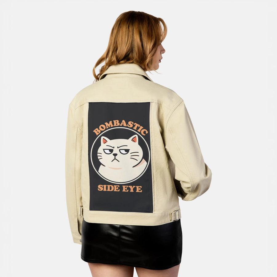 bombastic patch on female atelier canvas jacket in tan