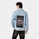 booksnotmurder patch on male og denim jacket in oceanside