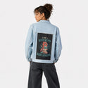 bookwormdragon patch on female og denim jacket in oceanside