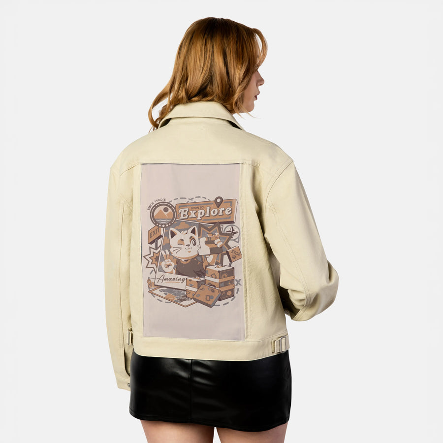 borntoexplore patch on female atelier canvas jacket in tan