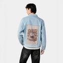 borntoexplore patch on male og denim jacket in oceanside
