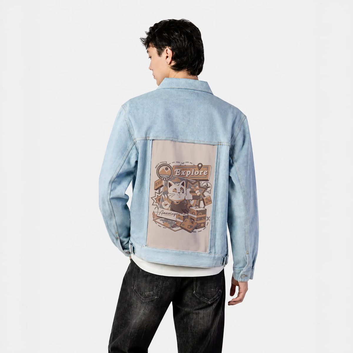borntoexplore patch on male og denim jacket in oceanside