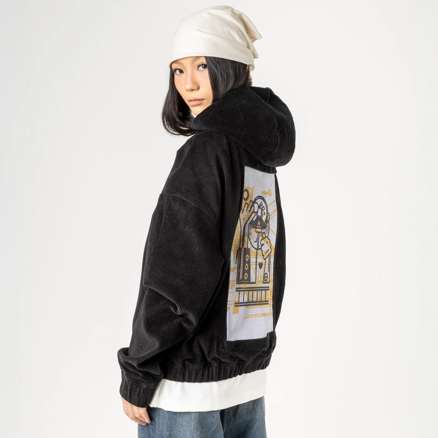 builder patch on female retro cord hoodie in onyx