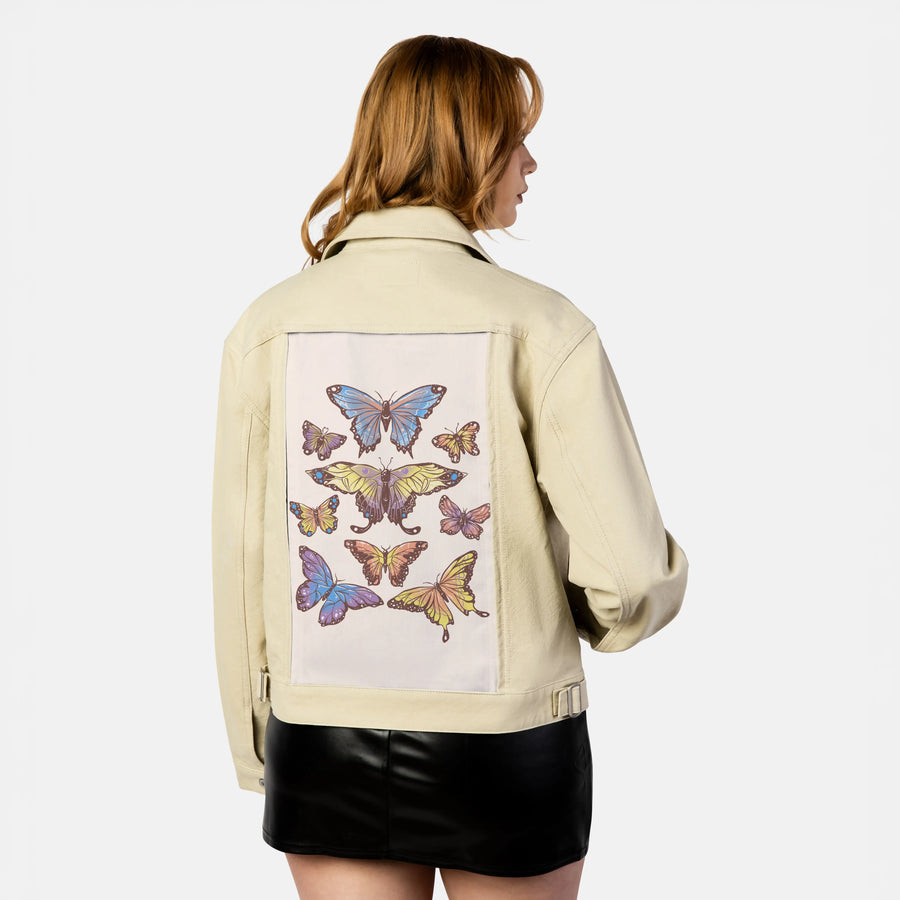 butterflies patch on female atelier canvas jacket in tan