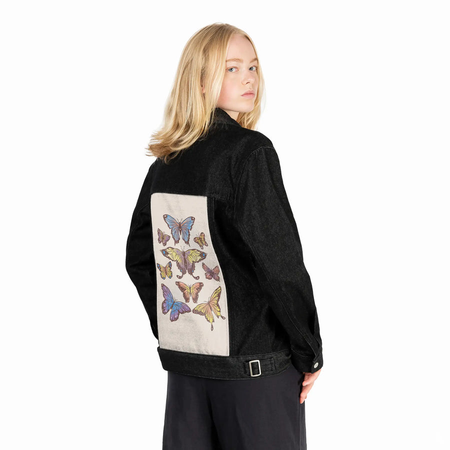 butterflies patch on female og denim jacket in raven