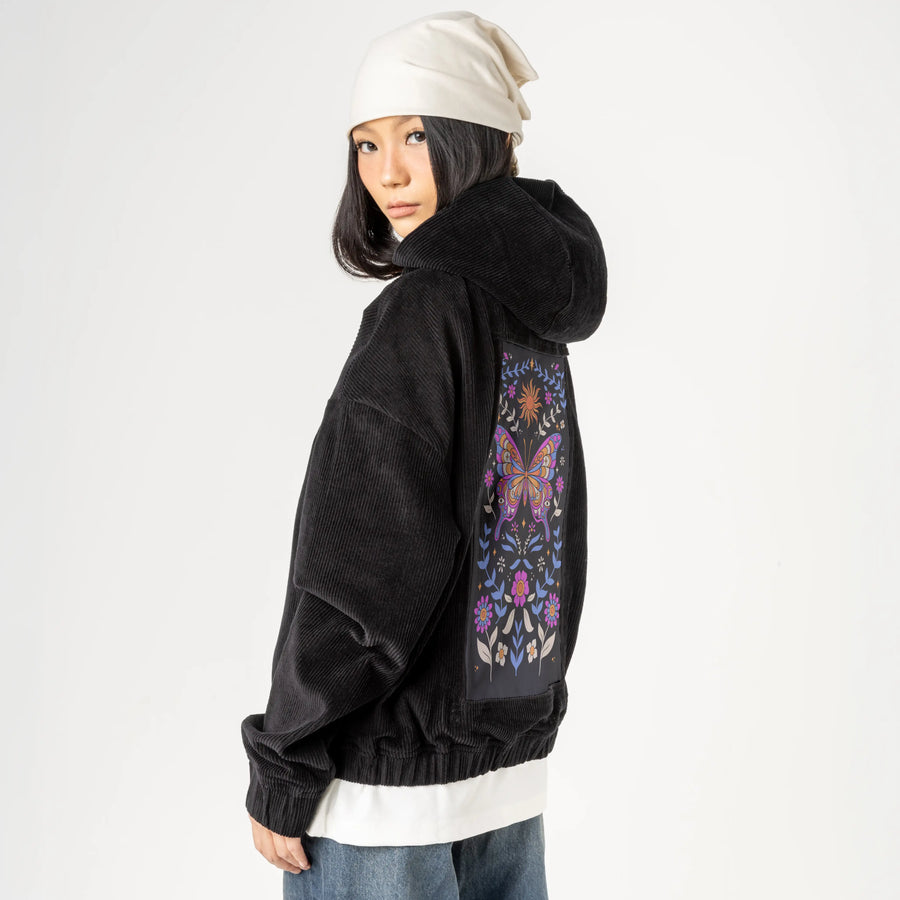 butterflykaleidoscope patch on female retro cord hoodie in onyx