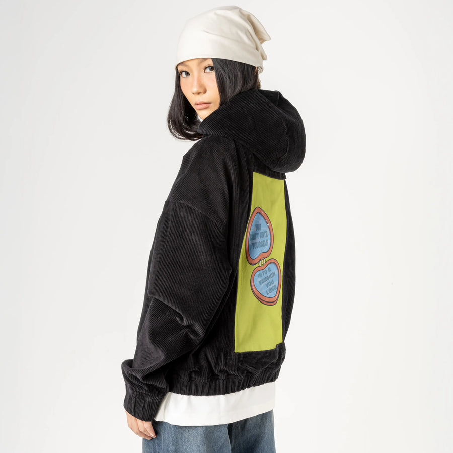 canthate patch on female retro cord hoodie in onyx