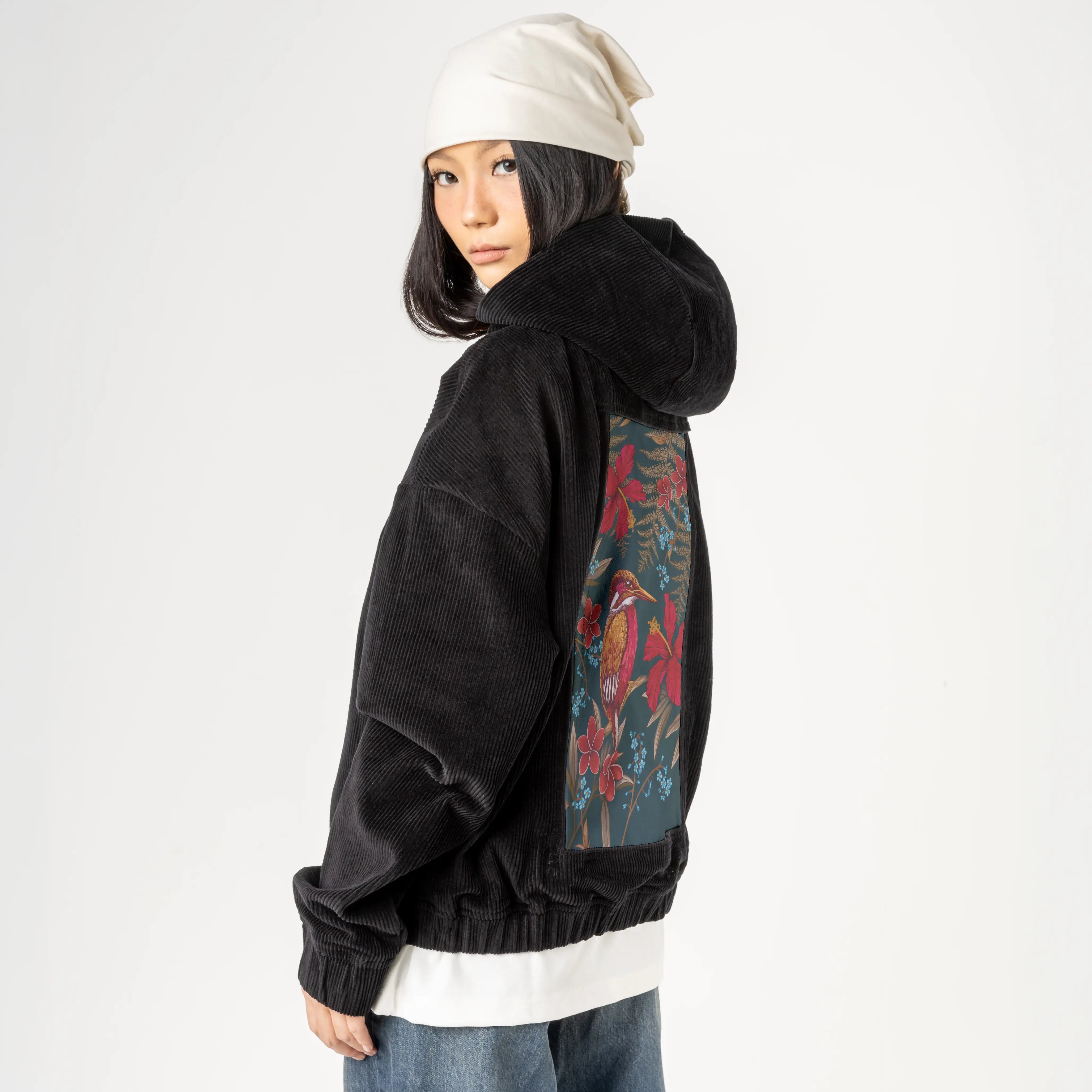 carminehummingbird patch on female retro cord hoodie in onyx