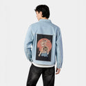 catanadamage patch on male og denim jacket in oceanside