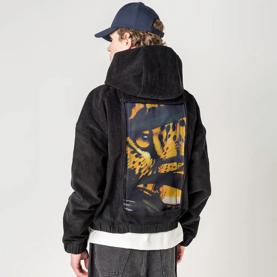 catchmeifyoucan patch on male retro cord hoodie in onyx