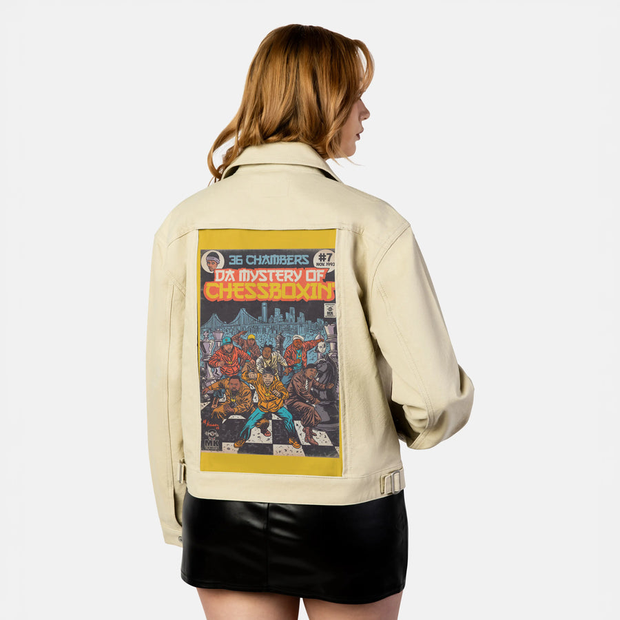 chessboxin patch on female atelier canvas jacket in tan