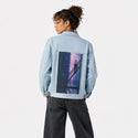 chilljoy patch on female og denim jacket in oceanside