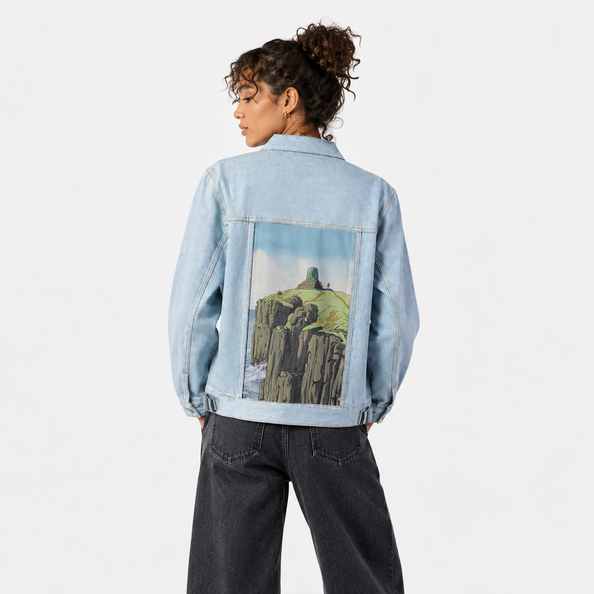 cliffshrine patch on female og denim jacket in oceanside