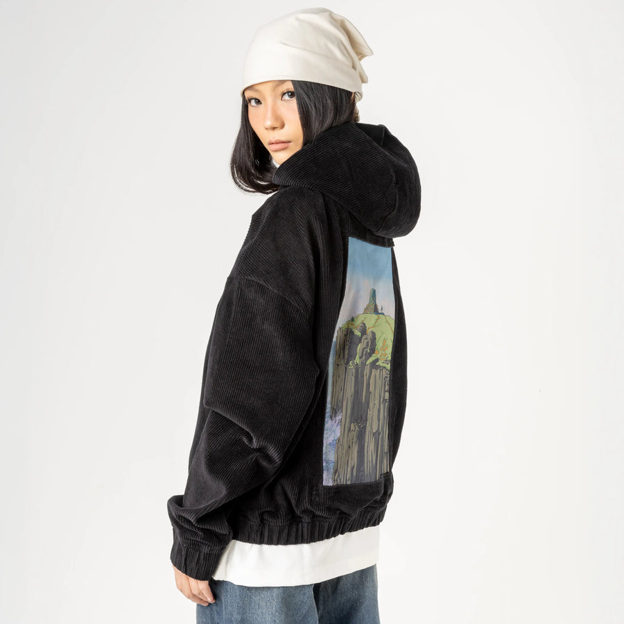 cliffshrine patch on female retro cord hoodie in onyx