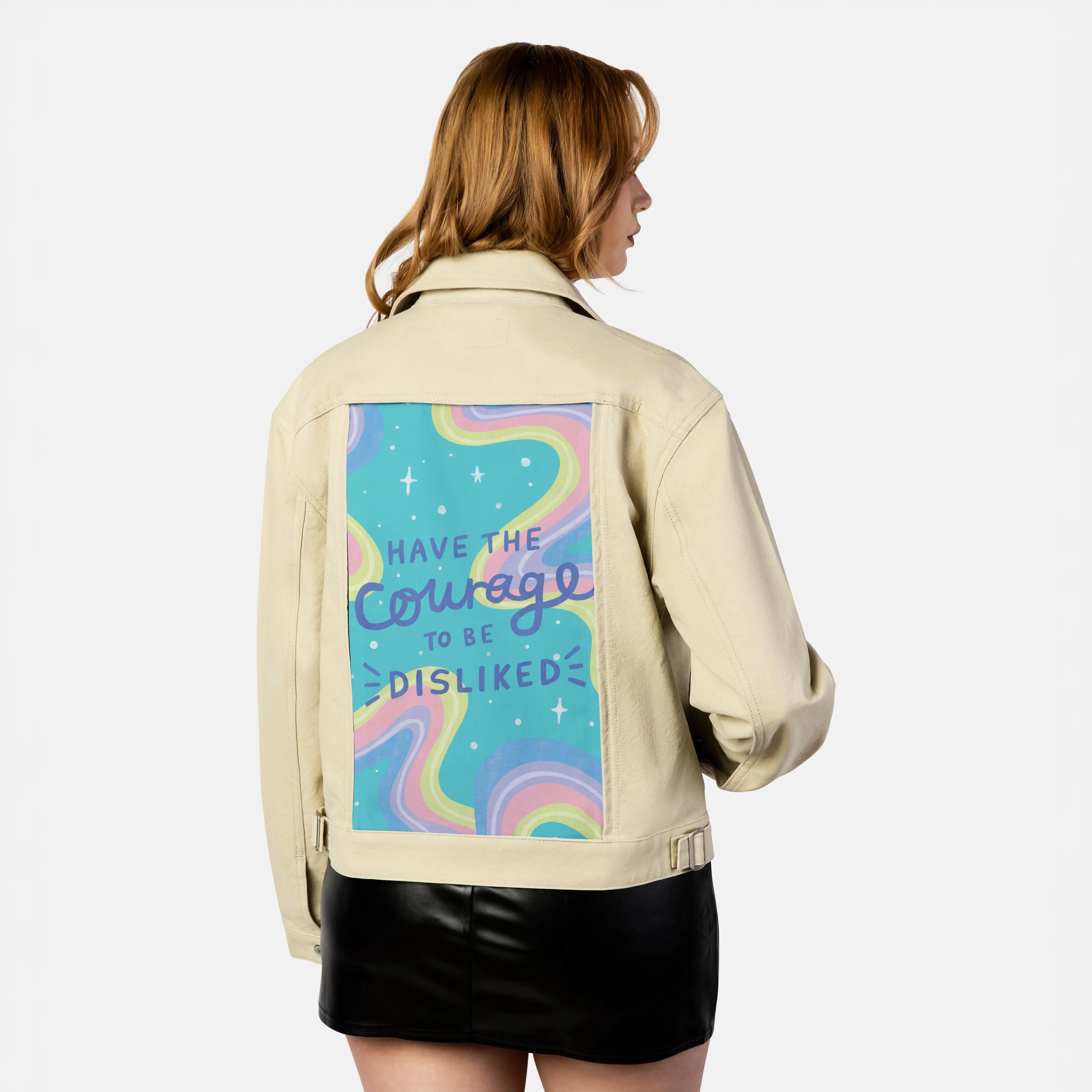courage patch on female atelier canvas jacket in tan