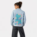 courage patch on female og denim jacket in oceanside