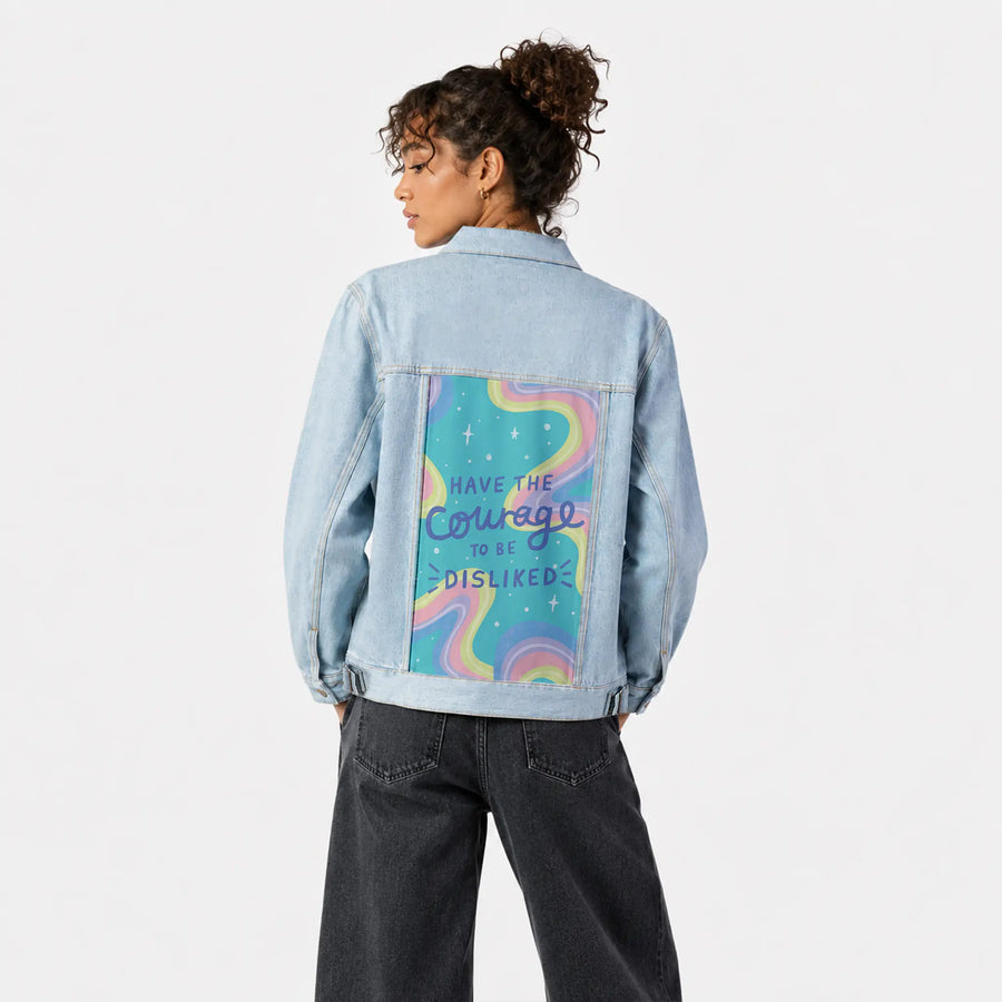 courage patch on female og denim jacket in oceanside