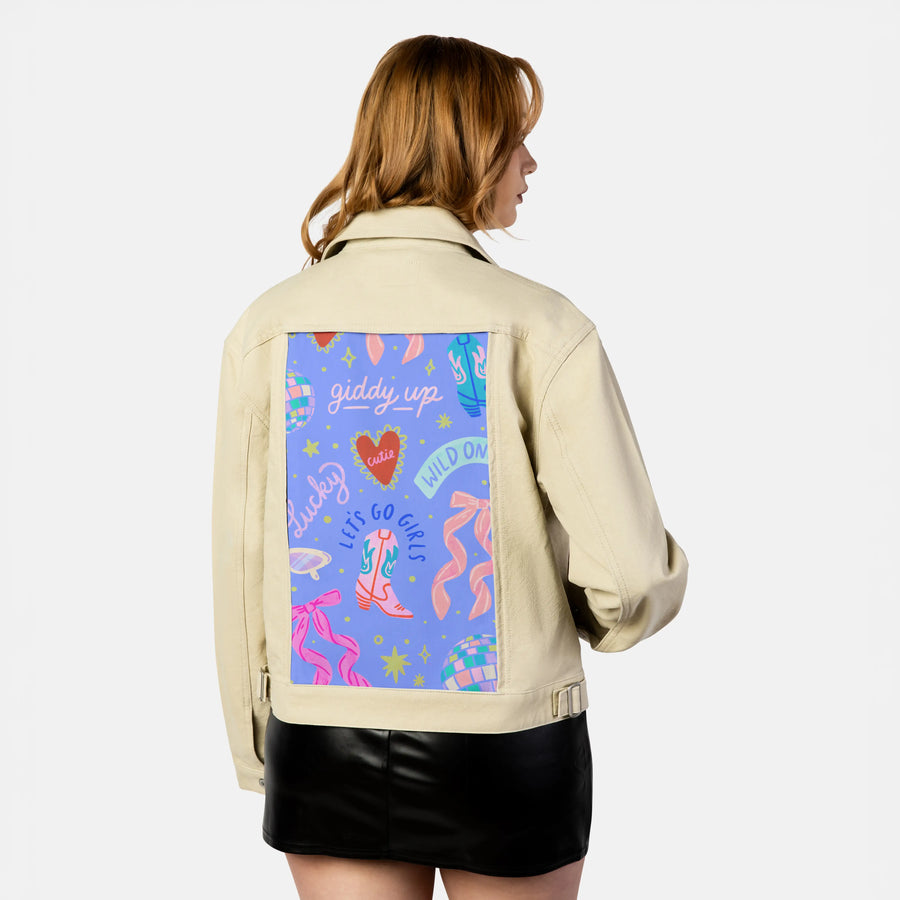 cowgirl patch on female atelier canvas jacket in tan