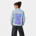 cowgirl patch on female og denim jacket in oceanside