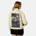 cyberdelorean2 patch on female atelier canvas jacket in tan