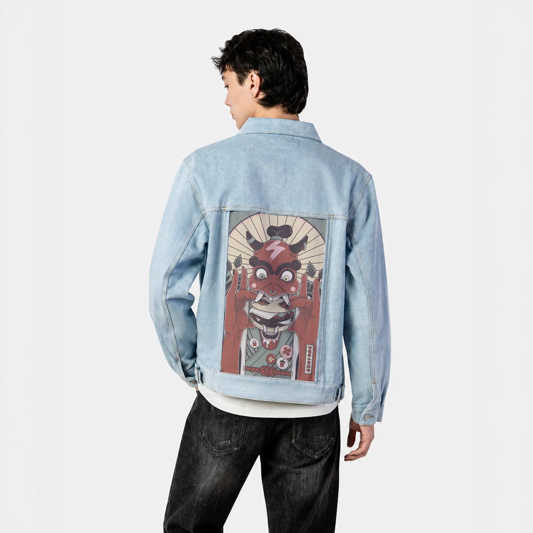 daemonburger patch on male og denim jacket in oceanside